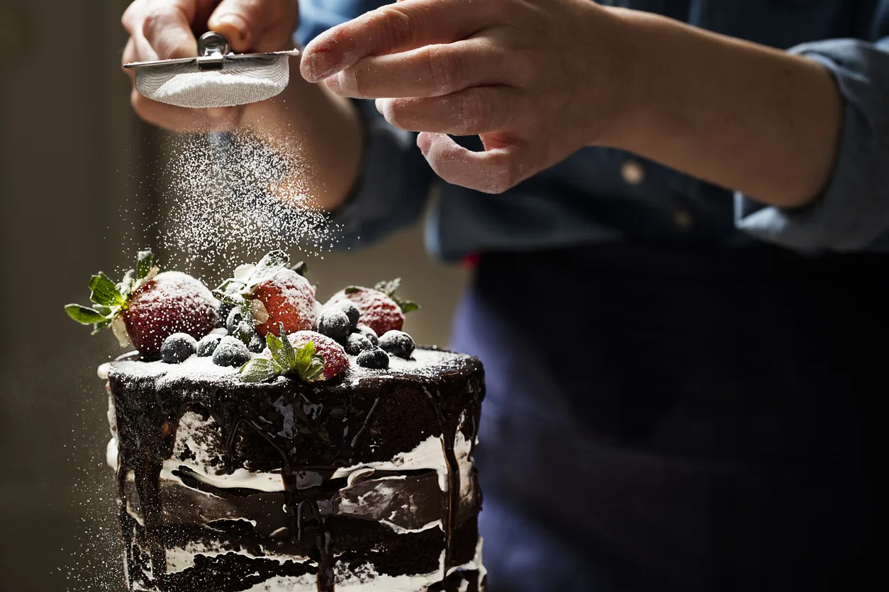 Chef is making chocolate cake