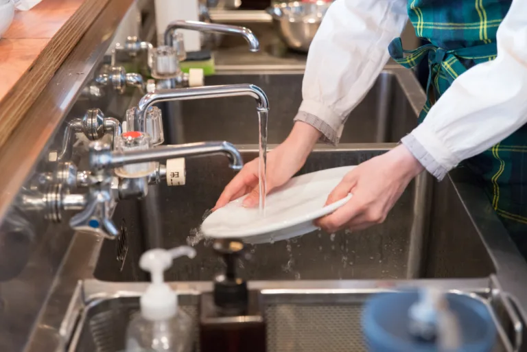 Young japanese lady is woking at kitchen